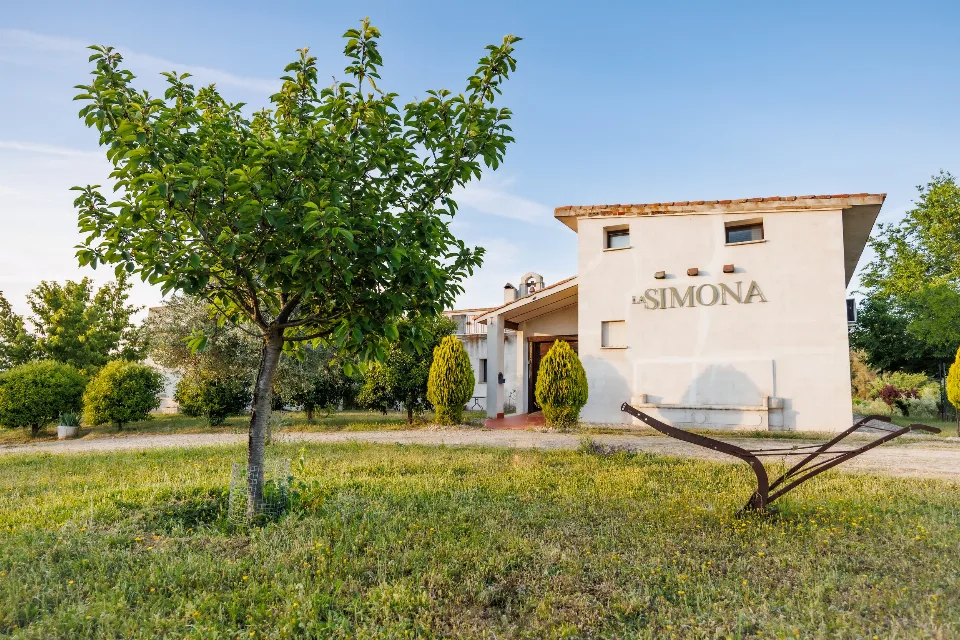 The estate entrance with the La Simona sign