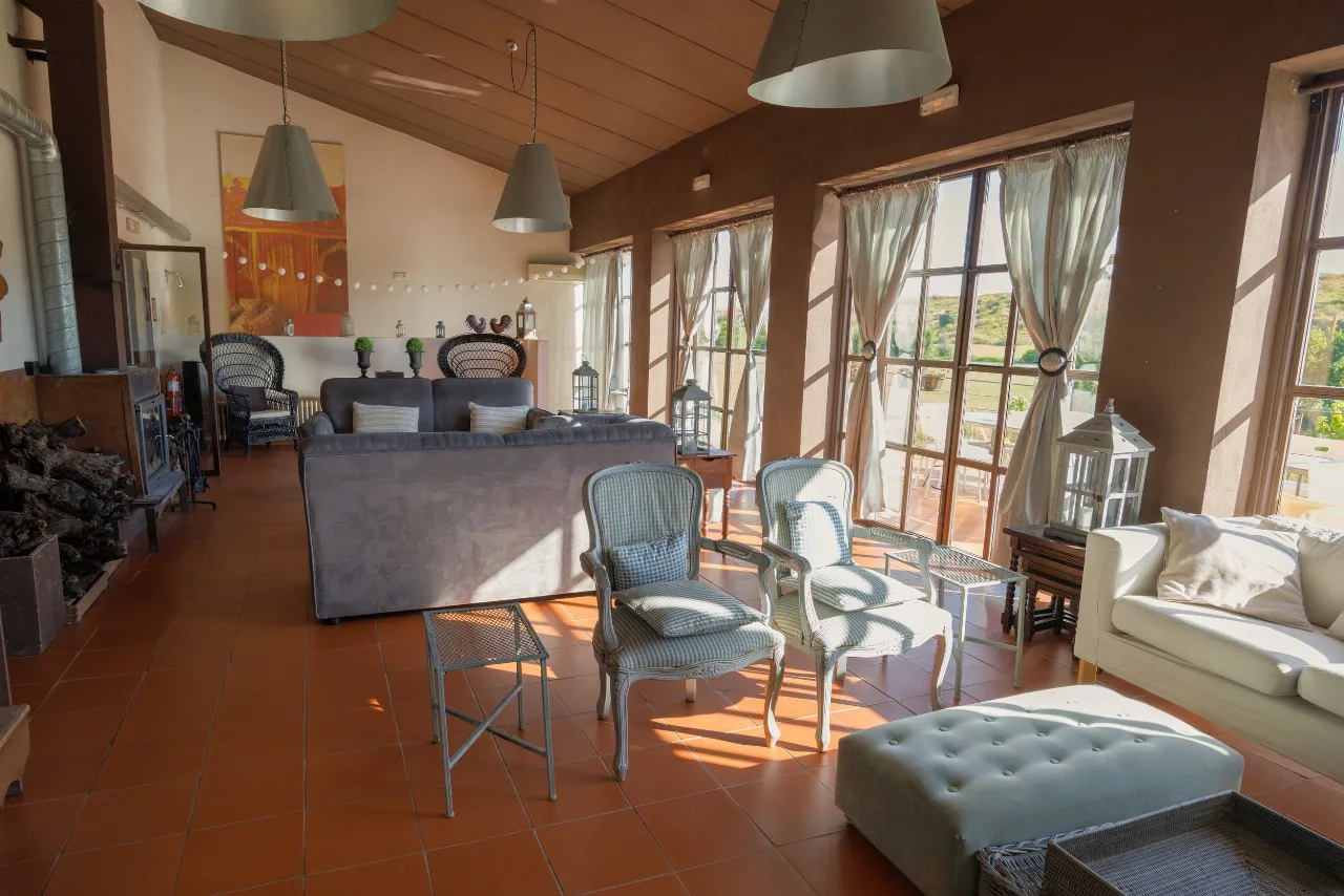 Living room with picture windows overlooking the countryside